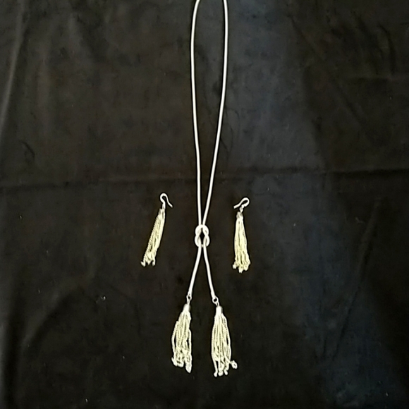 Silver toned tassel necklace with earrings. - Picture 1 of 2